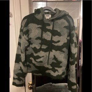 Pink camouflage hooded sweater.